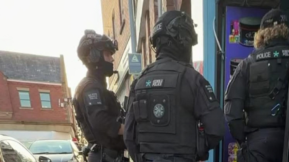  Armed officers descended on Queen Victoria Street in Macclesfield on Wednesday, September 23 (Credit: Supplied)