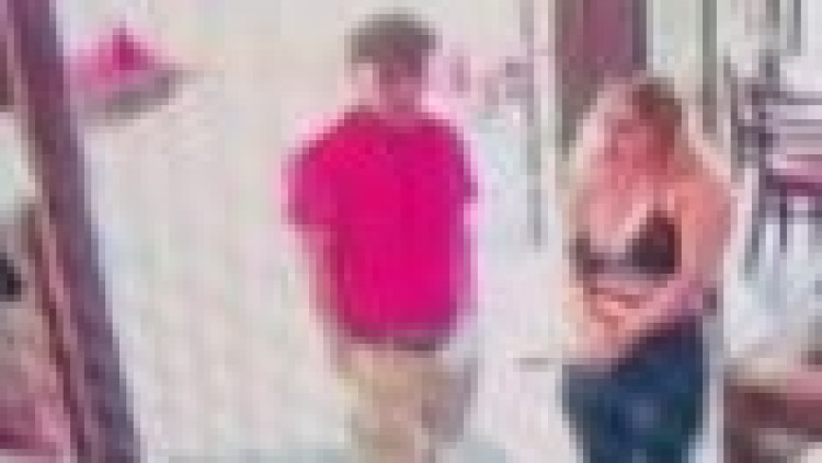 Police would like to the two people in the picture as they believe they could assist with their enquiries (Image via GMP)
