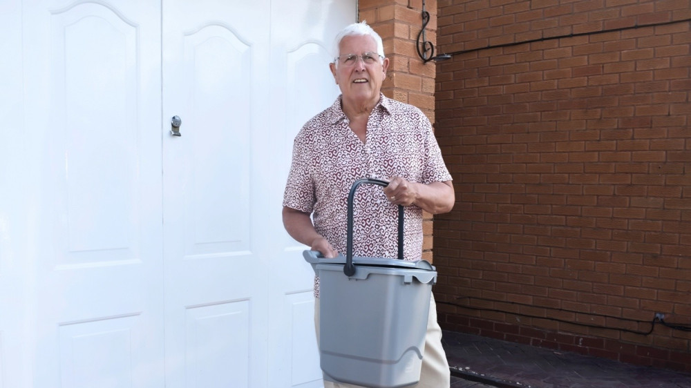 Cllr Ken Hawkins with the outdoor food caddy (Image supplied)