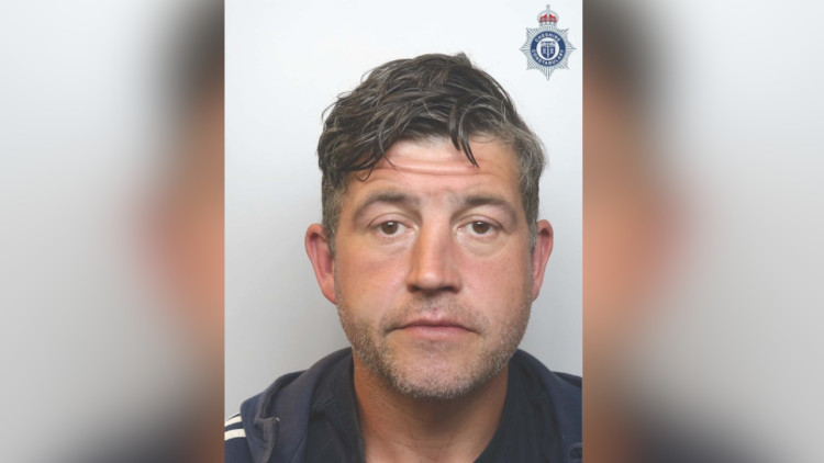 Andrew Holland is wanted on recall to prison (image via Cheshire Police)