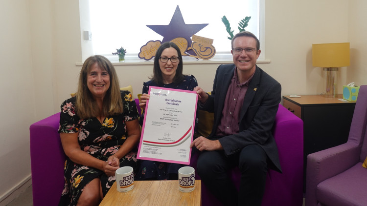 Just Drop-In's chief officer Ann Wright and counselling clinical lead Helen Lees with Tim Roca MP (Credit: Supplied)