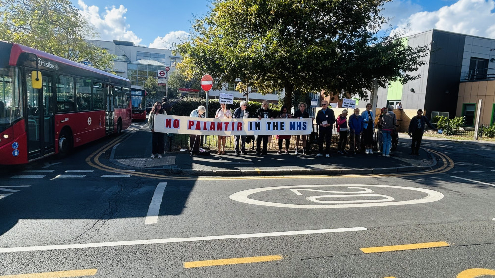 Residents from Kingston and the nearby area gathered in front of Kingston Hospital earlier today (Thursday, 1 October) to protest the NHS' contract with Palantir (Credit: Tilly O'Brien)