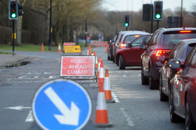 Temporary traffic lights and road closures continue to affect routes around Wells and Street.