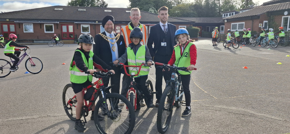 Solihull Mayor and Ward Cllr Baker with bikeability pupils (images supplied)