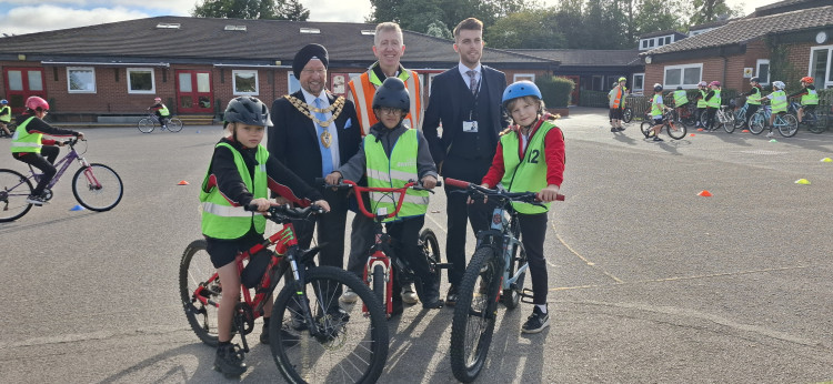 Solihull Mayor and Ward Cllr Baker with bikeability pupils (images supplied)