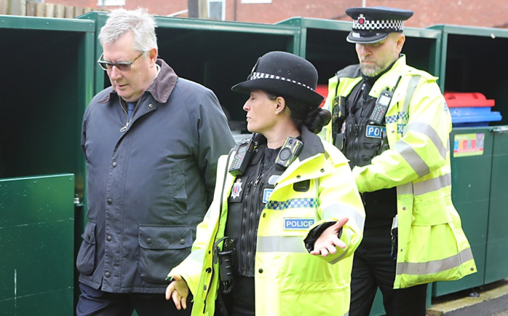 Roger Hirst on patrol with officers. 