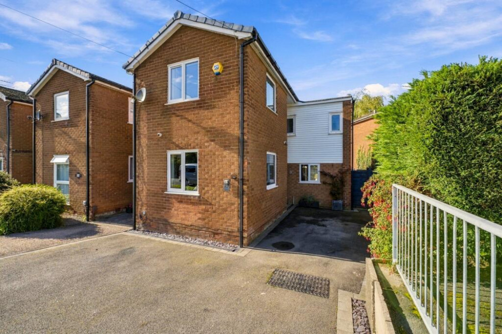 Our friends and sponsors at Julian Wadden present this 'rare' opportunity to buy this lovely three-bedroom link-detached canalside home in Marple (Image - Julian Wadden)