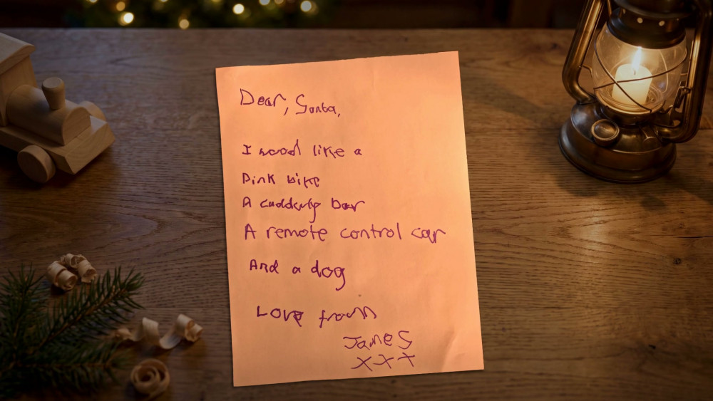 Parents photograph their child's Christmas list, and Santa reads it back to them word for word  (Image supplied)