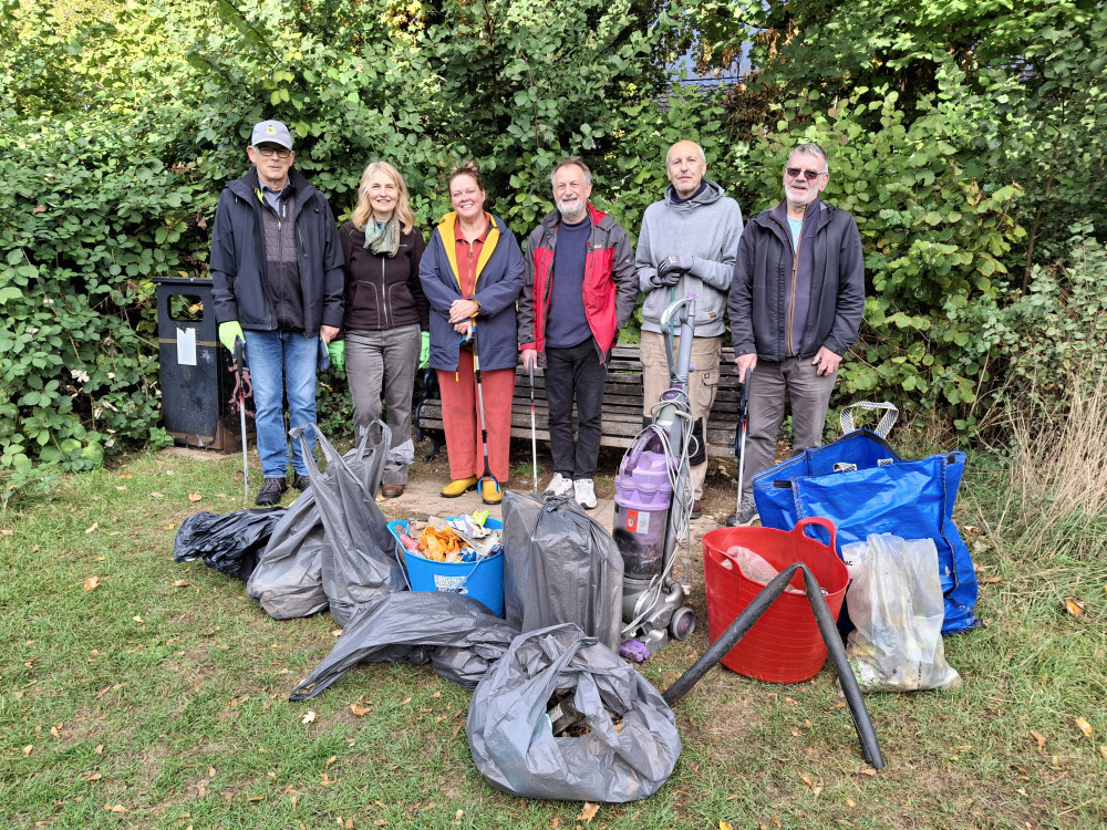 Members of the group working on Butts Close with their haul including the Dyson vacuum cleaner