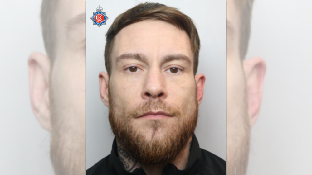 Police are appealing for information to help find 36-year-old Michael Hill/Houldsworth, who is wanted in connection with a burglary (Image - GMP)