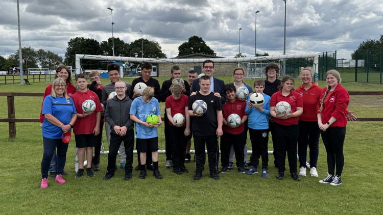 Dan Price, Cheshire PCC, with young people at Active Buddies, a previous recipient (Credit: Cheshire PCC)