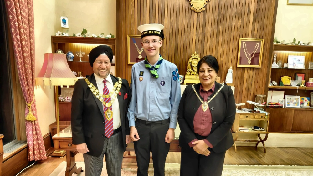 The Mayor of Solihull, Cllr Sardul Marwa MBE JP, with Josh Tomlinson, the new Mayor's Sea Scout, and Satnam Kaur Marwa JP LLB, the Mayoress (Image supplied)