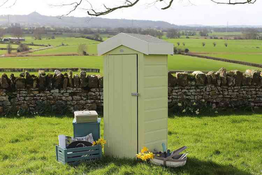 Rhyne Green Wood Paint on shed with Glastonbury Tor in the background Rhyne Green Wood Paint on shed with Glastonbury Tor in the background