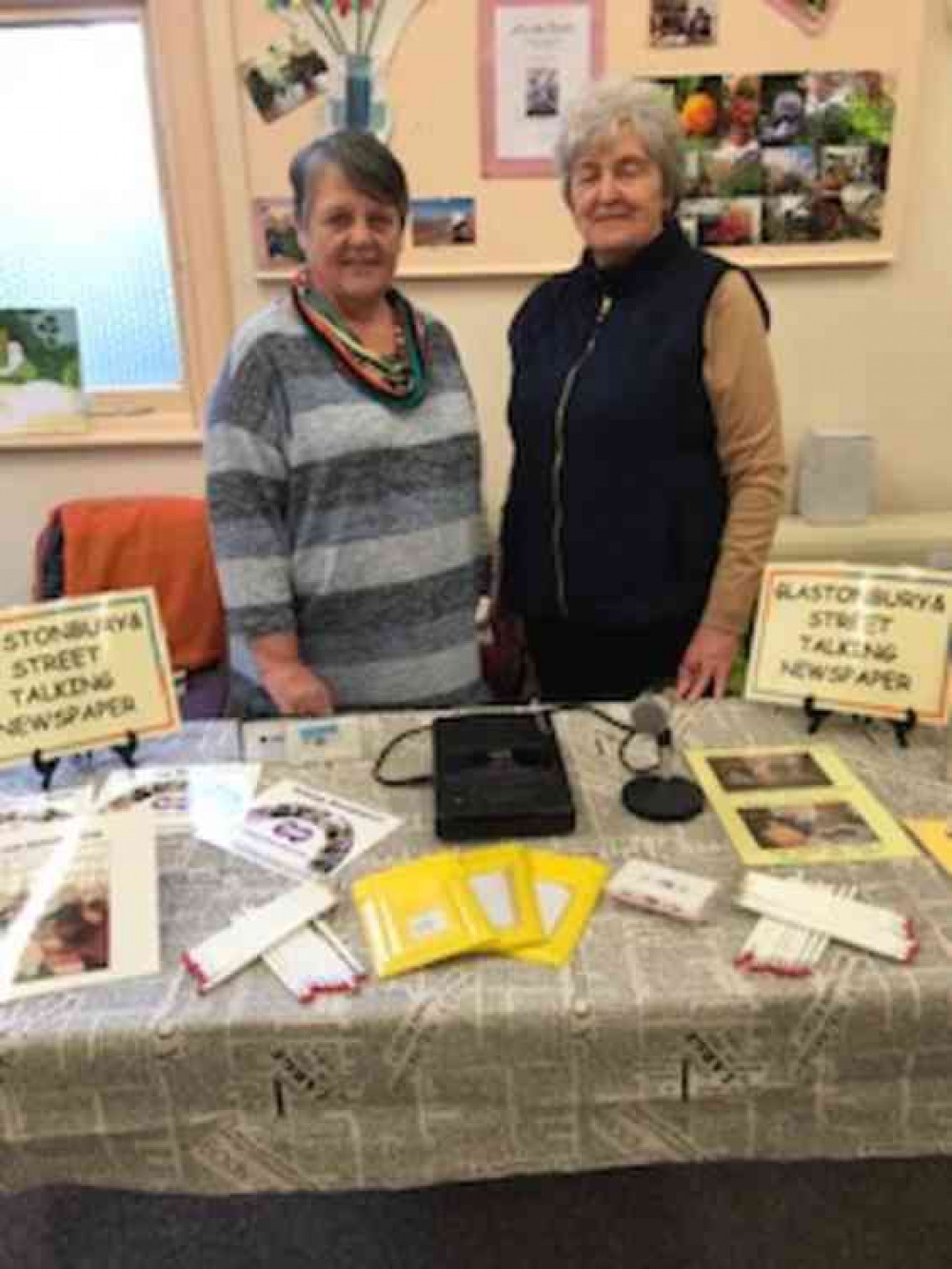 Volunteers man the information table at the Discover Your Community Event in Street Volunteers man the information table at the Discover Your Community Event in Street