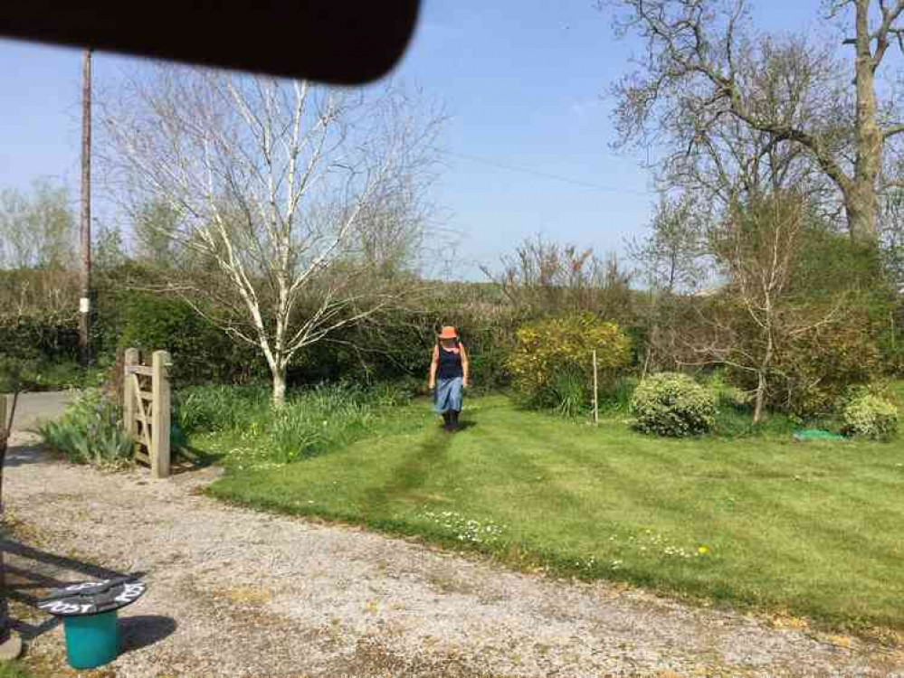 Joanna Stevens walking a marathon in her back garden