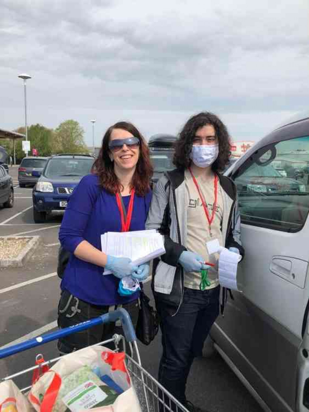 Volunteers Tracey and her son Azra