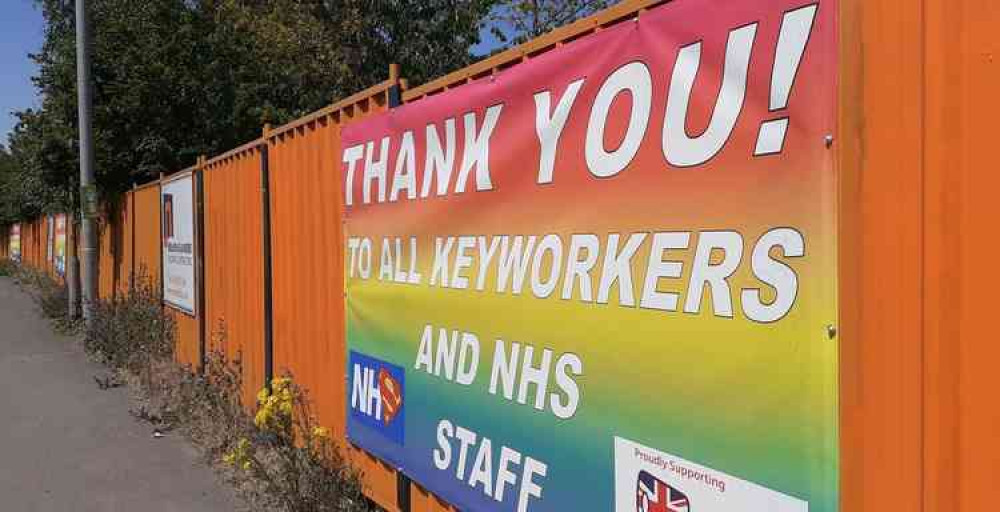 The banner that has been put up in Street Road, Glastonbury