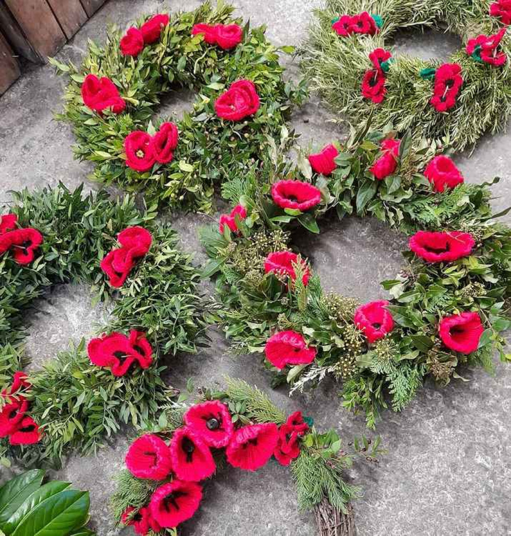Wreaths of woollen poppies created by Luce Loves Flowers, Street Wreaths of woollen poppies created by Luce Loves Flowers, Street
