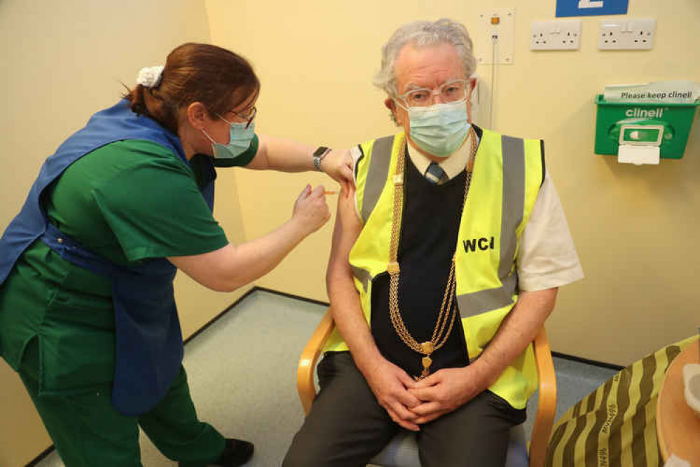 Former editor of the Central Somerset Gazette, Philip Welch, receives his vaccination at the West Mendip Hospital