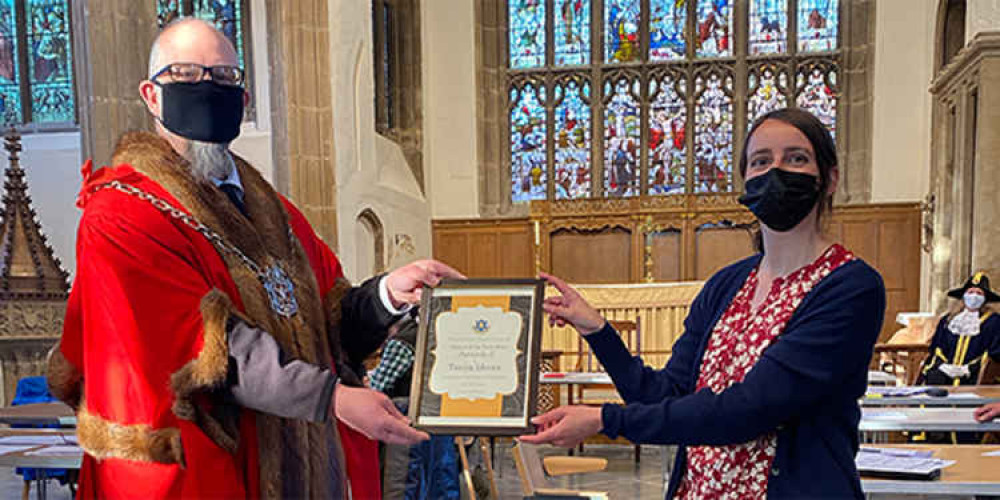 Tanya Moore receives her award from Mayor of Glastonbury Jon Cousins