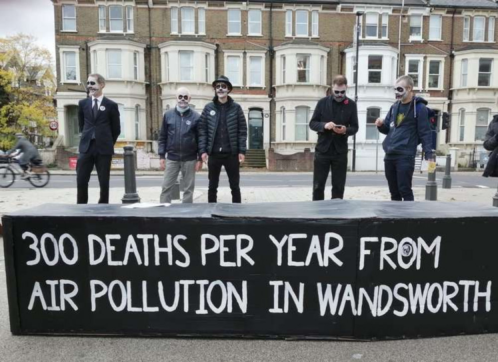 members of XR marched with a double-life sized coffin from the event to Clapham Junction and back (credit: XR Wandsworth)