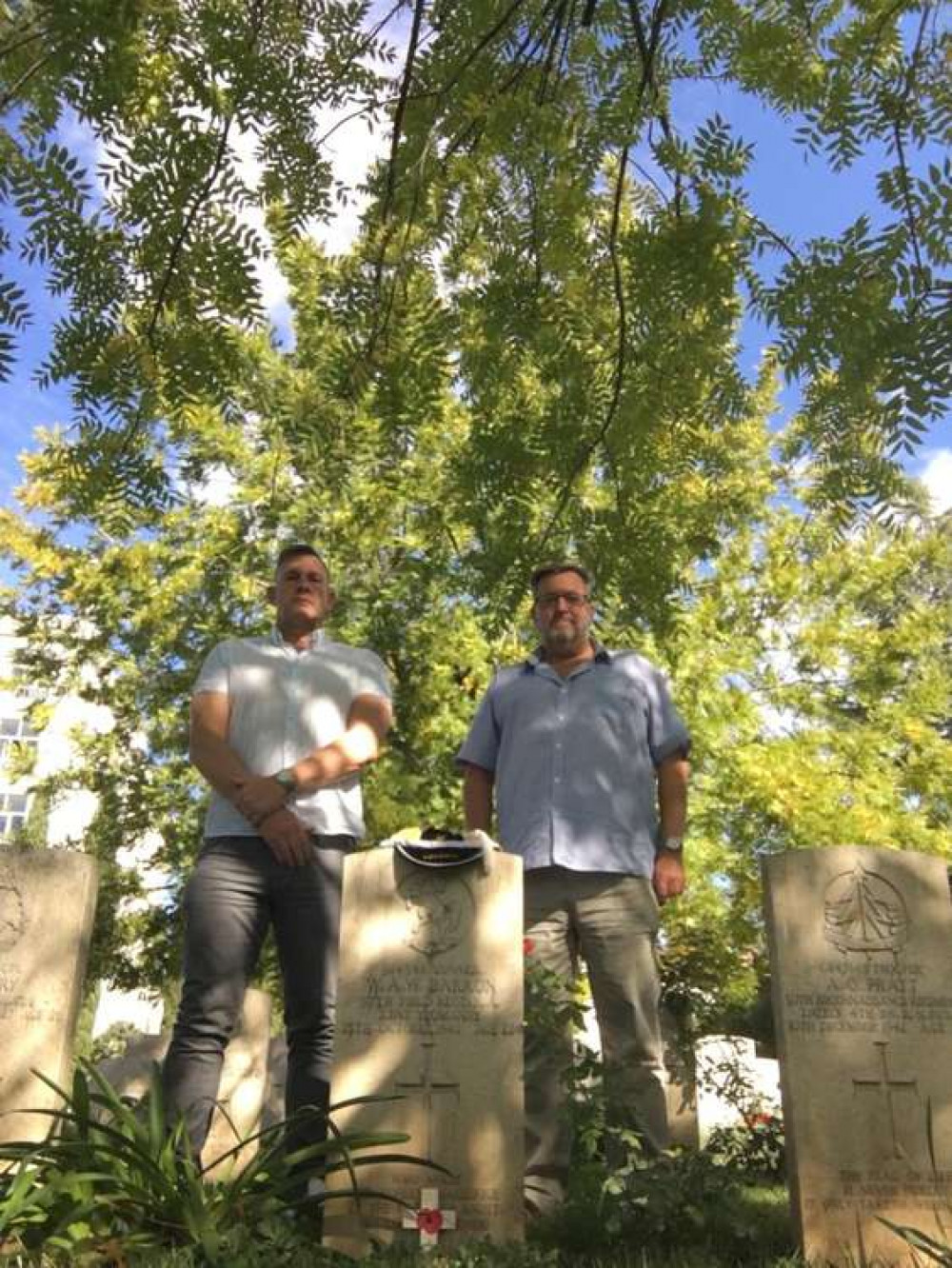 Adam Winwood and treasurer Chris 'Taff' Marshall at William 'Billy' Barron's grave in Caserta, just north of Naples. CREDIT: Letchworth Rugby Club