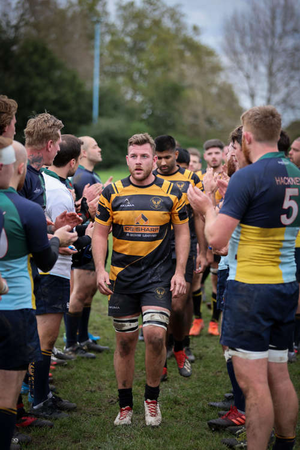 Liam Fitts (captain) and Hem Johal go through the tunnel at full-time. CREDIT: Mike Waters @majwaters