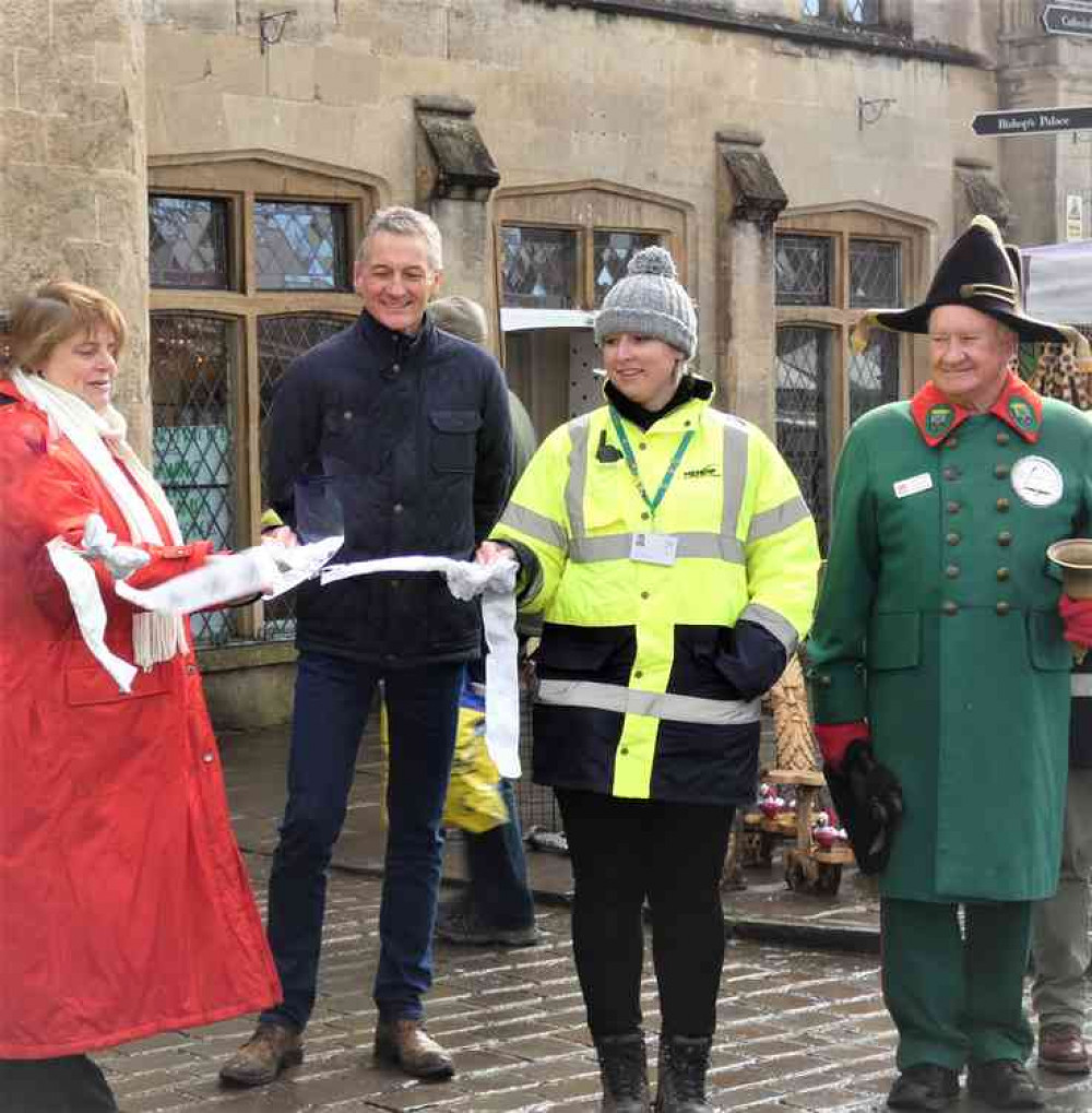 Local dignitaries declare Wells Christmas Market open for business, from left, leader of Mendip District Council, Cllr Ros Wyke; Stuart Brown, chief executive, Mendip District Council; Haylee Wilkins, Mendip District Council's group manager for neighbou