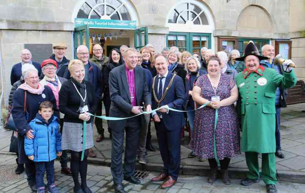 Cutting the ribbon to open the new Tourist Information Centre at Wells Town Hall