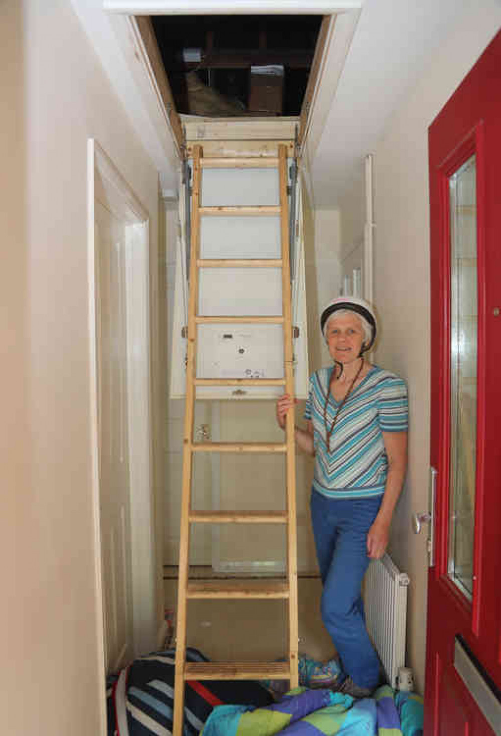 Sue Jones ready to climb her loft ladder