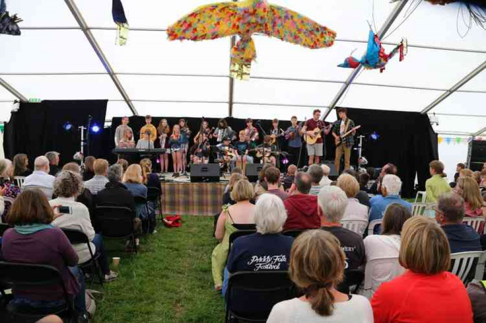 Blue School performers on the Priddy Mainstage last year (Photo: Focus on Photography Wells photo club led by Stuart Baynes, a Priddy resident) Blue School performers on the Priddy Mainstage last year (Photo: Focus on Photography Wells photo club led by Stuart Baynes, a Priddy resident)