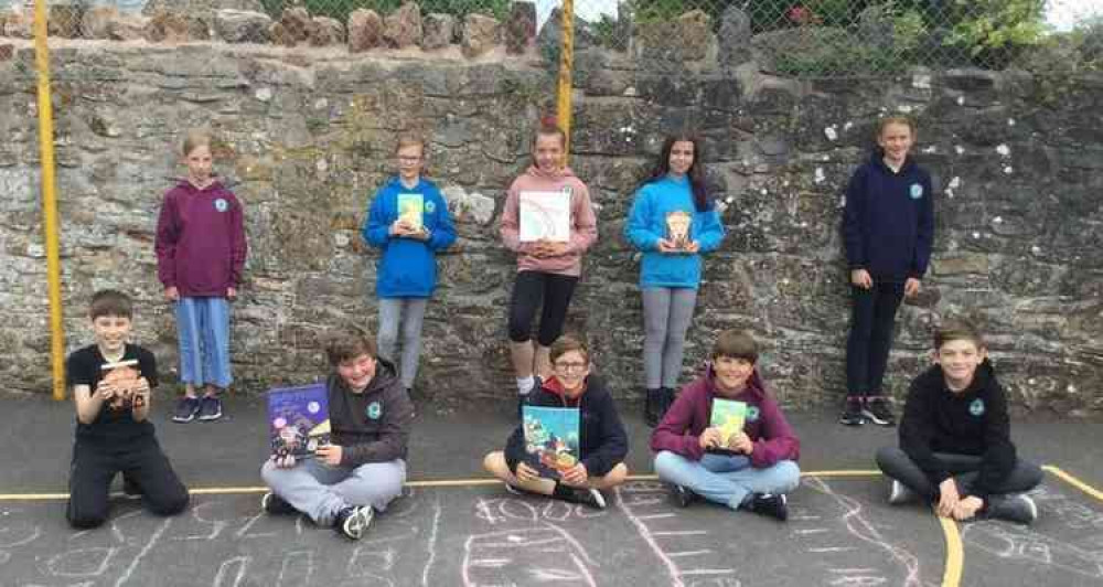 East Harptree schoolchildren with their book donations