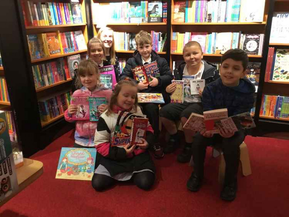 Children with their chosen books at Waterstones