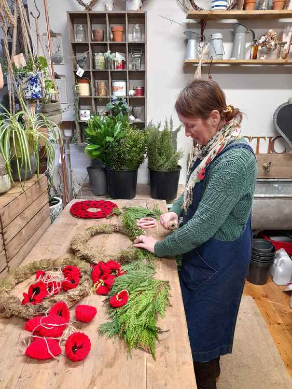 Wreaths of woollen poppies created by Luce Loves Flowers, Street