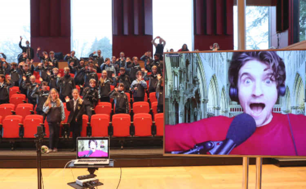 Wells Cathedral School pupils joined by Greg James in Friday morning assembly