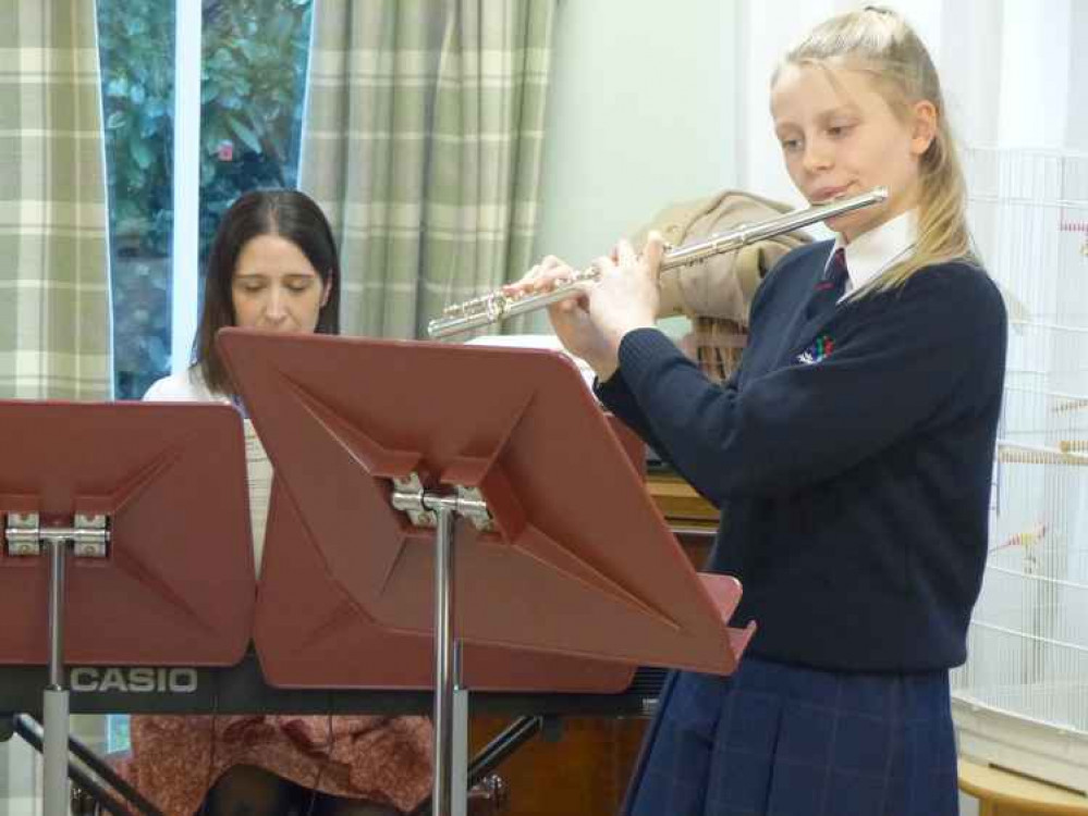 A Millfield Prep pupil performing at a care home last year before lockdown A Millfield Prep pupil performing at a care home last year before lockdown