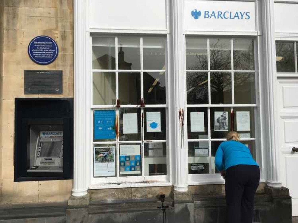 Fake oil on the window frames of Barclays in Wells, staff having already cleaned it off the windows Fake oil on the window frames of Barclays in Wells, staff having already cleaned it off the windows