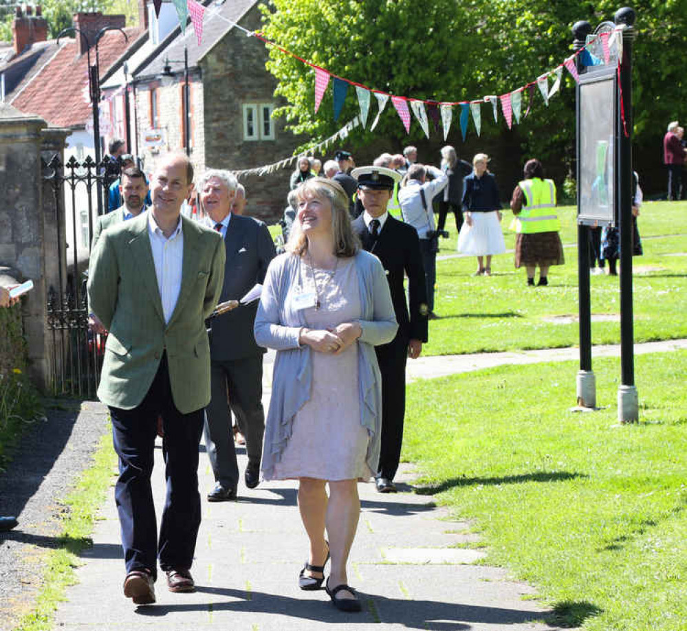 Kirstie Harris escorts the Earl out of the churchyard Kirstie Harris escorts the Earl out of the churchyard
