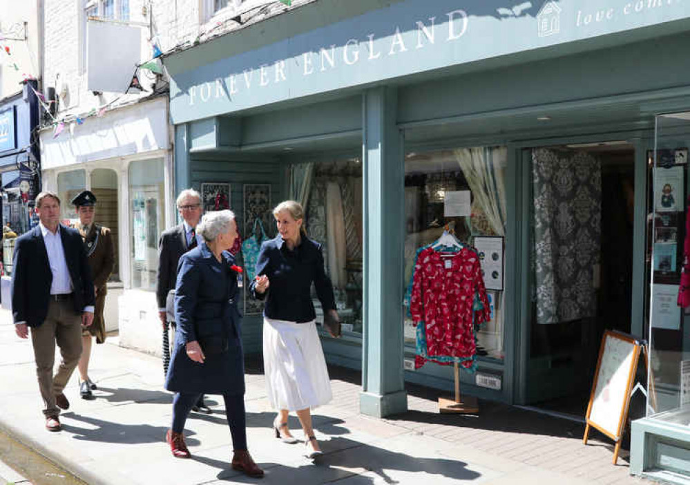 Sarah Briton leads the Countess up the left-hand side of the High Street to the Market Place Sarah Briton leads the Countess up the left-hand side of the High Street to the Market Place